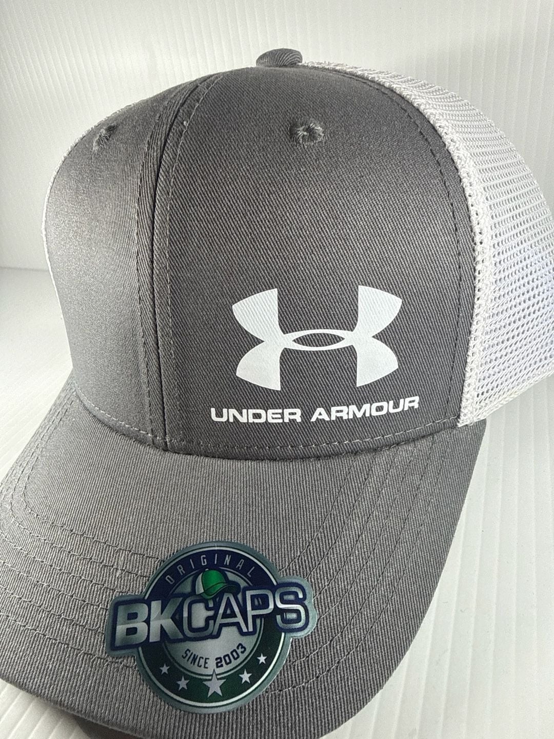 BK Caps Under Armour Logo Grey and White Mesh Back Trucker Hat OSFA