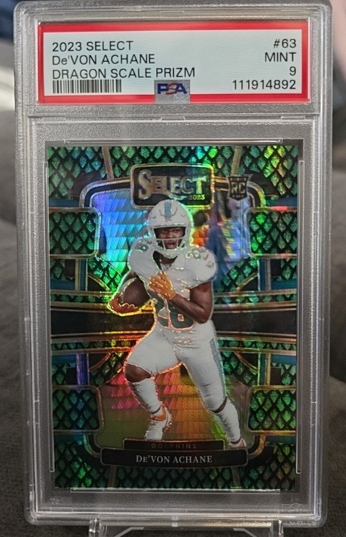 2023 Panini Select - Concourse De'Von Achane #63 Dragon Scale Prizm /70 (RC)