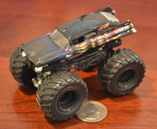 HOT WHEELS MONSTER JAM CADIAC ARREST BLACK 1:64 DIECAST MONSTER TRUCK CADILLAC