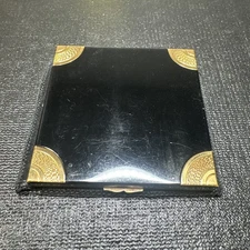 Vintage Colibri compact. Elegant black enamel gilt Loose powder compact. 1950s