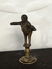 A VICTORIAN BRONZE/BRASS PIPE TAMPER IN THE FORM OF MR. PICKWICK — photo 1