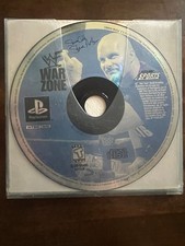 Two Classic PS1 Games: WWF Warzone and Tomb Raider II - Discs Only