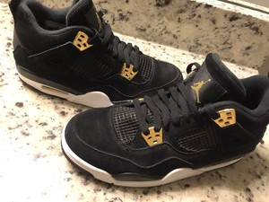 jordan retro 4 gold and black