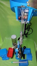 Dillon RL550 Reloader With Case Feeder, Carbide 45acp Dies, Strong Mount ,xtras