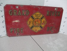 Departamento de bomberos voluntarios de Grand River años 30? casco metal estación bomberos letrero