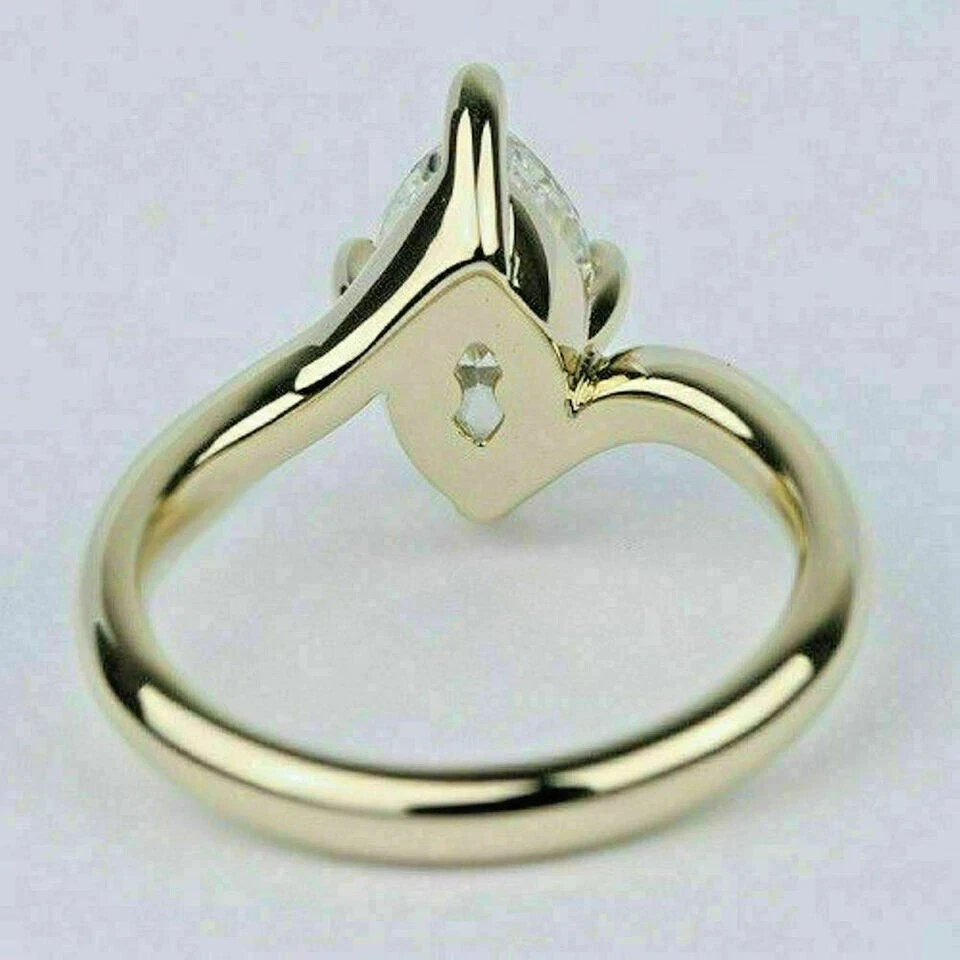 Anillo de boda solitario de diamantes creado en laboratorio marquesa de 2 quilates enchapado en oro amarillo de 14 quilates Foto 4 de 4