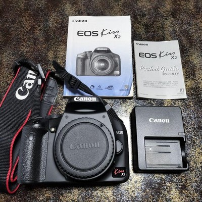 Canon EOS Kiss X Digital Camera with Charger Strap and Guide Booklet