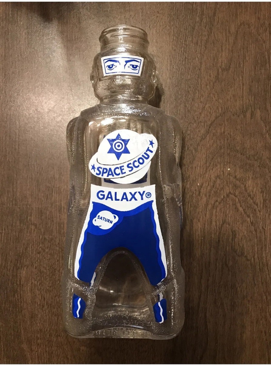 12 GALAXY SPACE FOODS SPACEMAN ASTRONAUT SODA SYRUP BOTTLE COIN