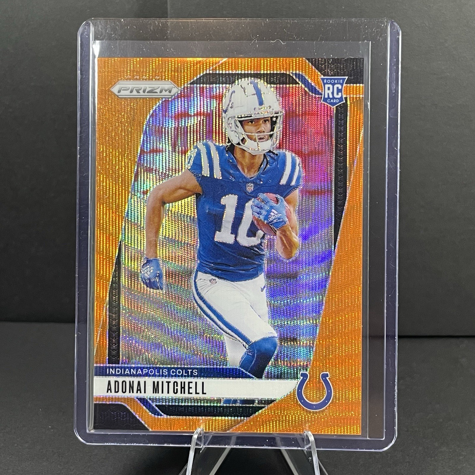 2024 Panini Prizm - Rookies Adonai Mitchell #303 Orange Wave Prizm /60 (RC)