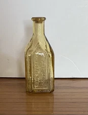 Vintage WHEATON GLASS Chief Wahoo Electric Tonic Cathedral Brand Amber Bottle