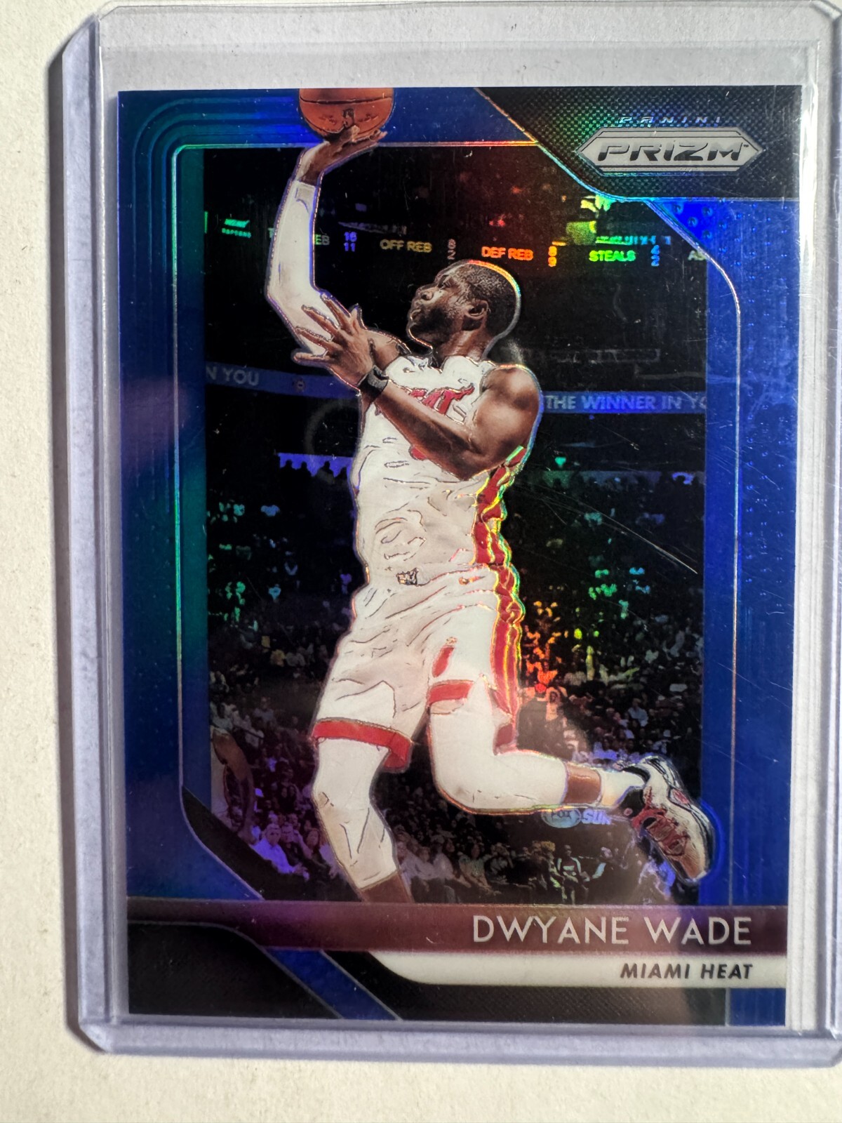 K281,853 - 2018-19 Panini Prizm Prizms Blue #206 Dwyane Wade #/199