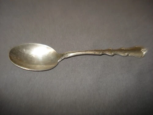 ONE INTERNATIONAL STERLING SILVER SPOON - ANGELIQUE PATTERN