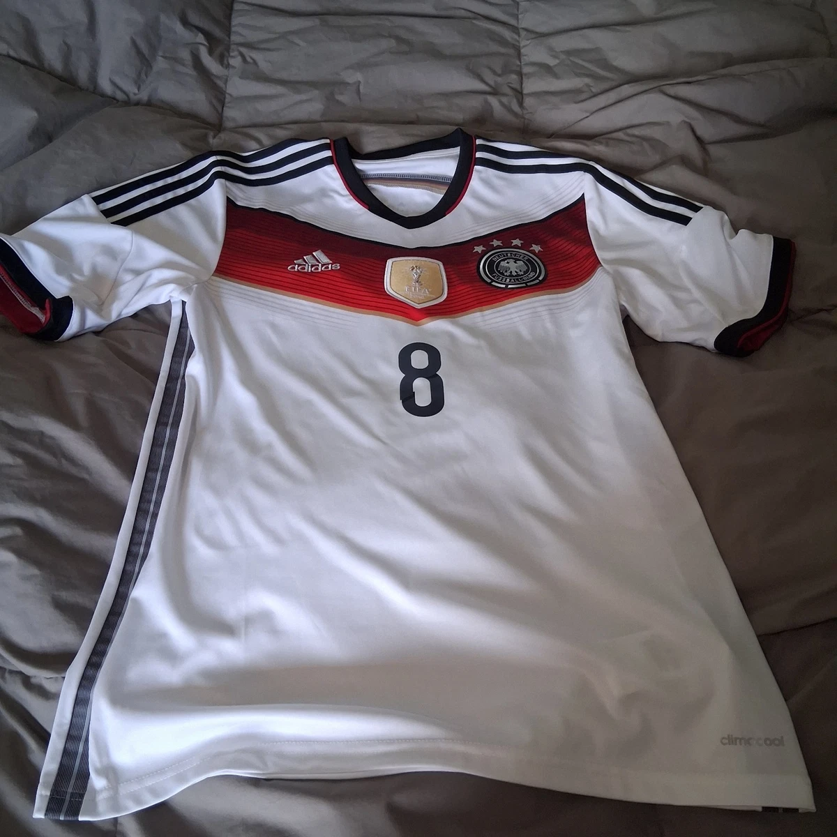 Preços baixos em Mesut özil Alemanha Branco National Team Roupas e