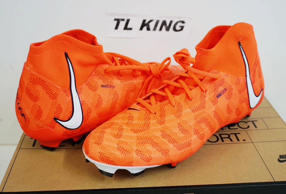 Bright orange top soccer cleats