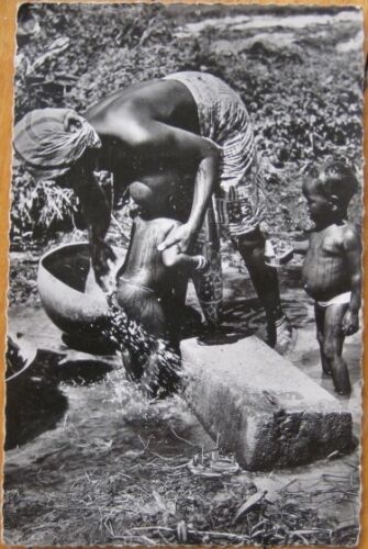 Black/African Mother & Baby Bathing 1956 Realphoto Postcard- Ivory Coast, Africa - Afbeelding 1 van 1