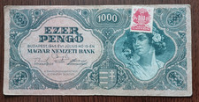 1945 HUNGARY 1000 EZER PENGO BANKNOTE WITH RED LABEL AND WOMAN PORTRAIT.