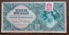 1945 HUNGARY 1000 EZER PENGO BANKNOTE WITH RED LABEL AND WOMAN PORTRAIT.