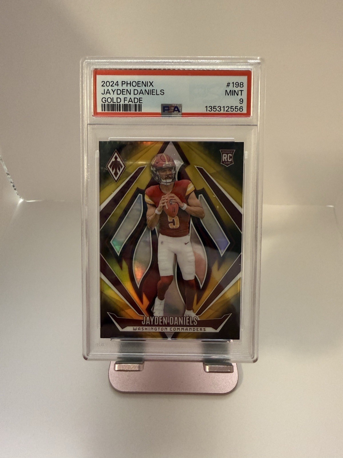 2024 Panini Phoenix - Rookies Jayden Daniels #198 Gold Fade /125 (RC)