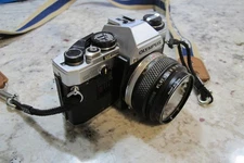 Olympus OM-10 35mm SLR w/ F:1.8 50mm Lens