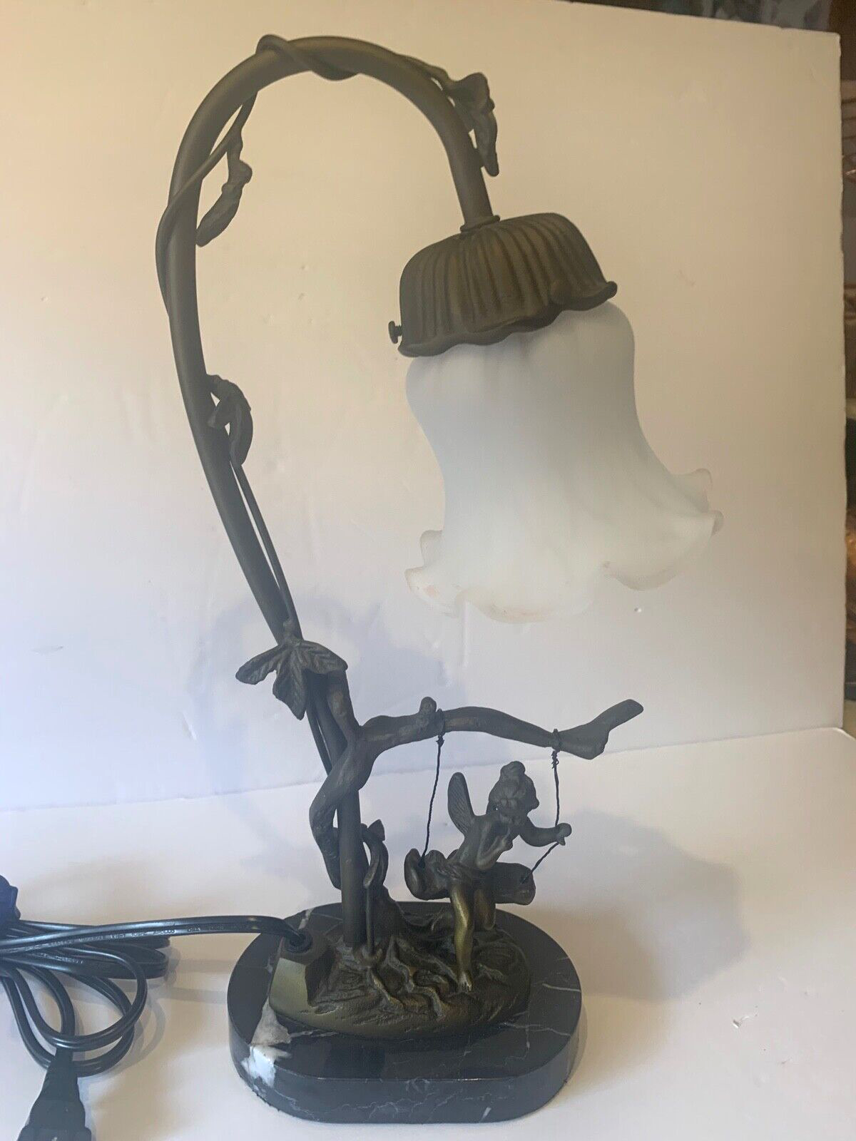 Table Lamp Tiffany style Marble Base Bronze Glass Shade Cherub Sitting On Swing.-image