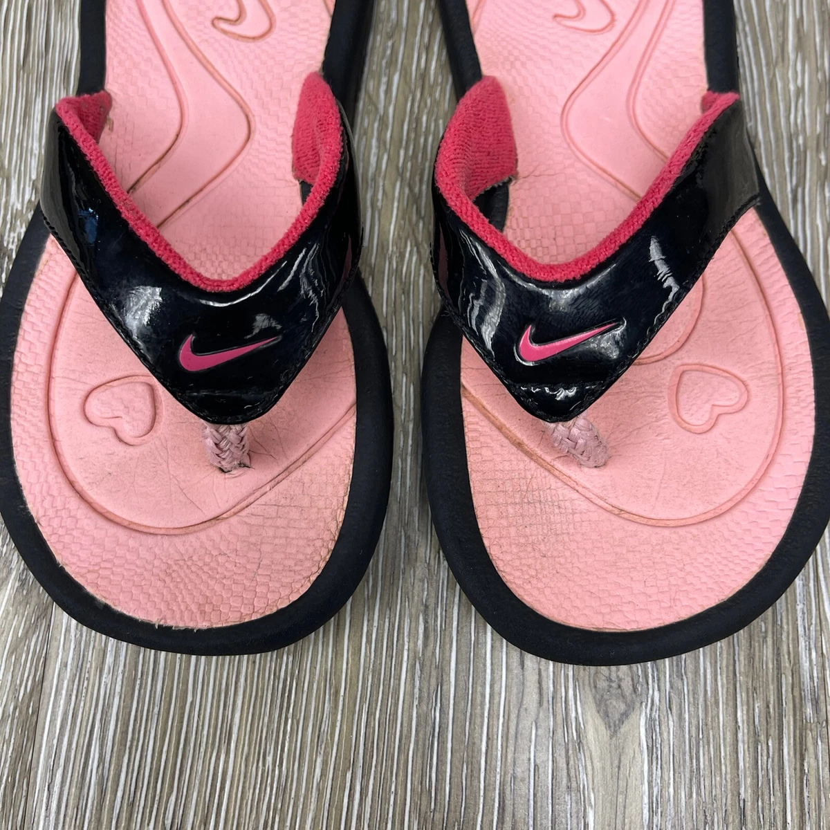 Hot pink top nike sandals