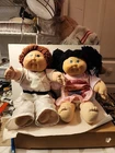 vintage collectible dolls from the Cabbage Patch Kids line, likely from 1980s