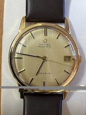 Gents solid 9 carat gold dare Geneve automatic watch. Serviced with Omega clasp.