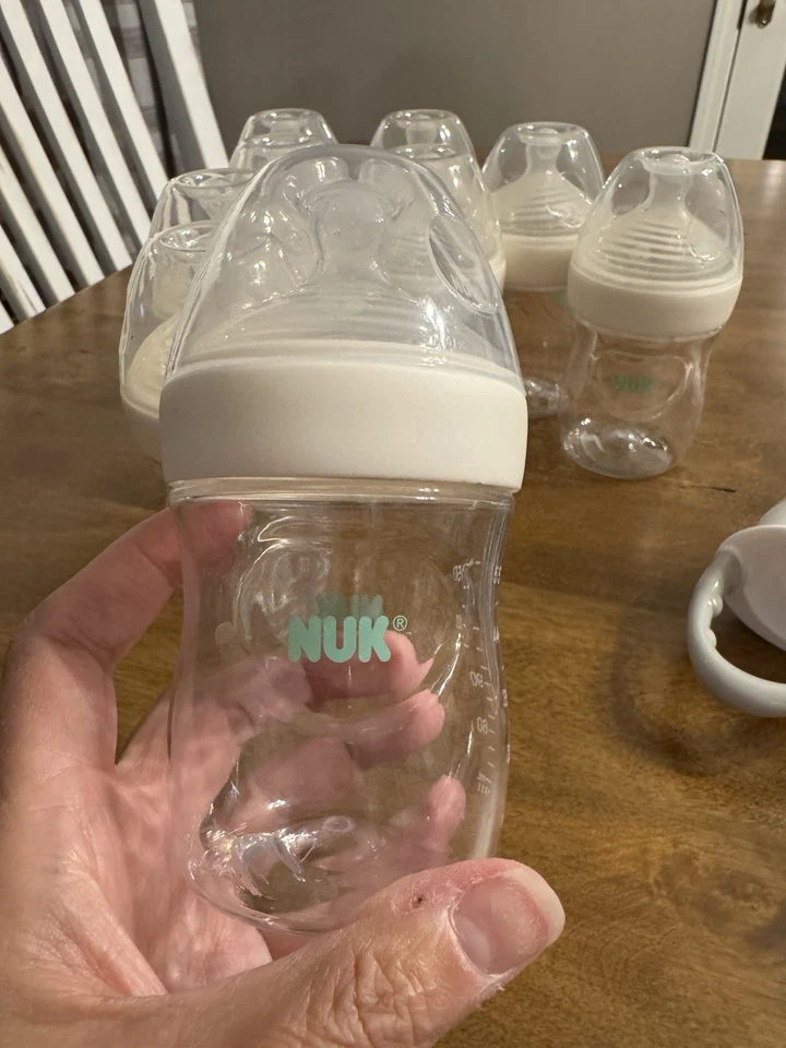 Juego de 9 biberones Nuk de 5 oz con 1 introductor de alimentos Dr Brown Foto 4 de 4