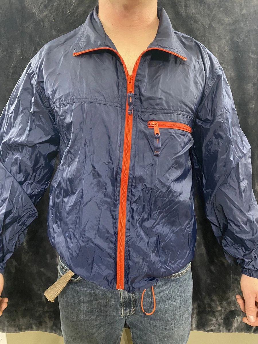 Navy blue top and orange jacket