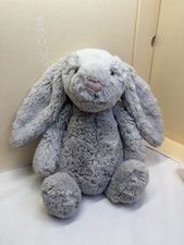Soft and cuddly gray bunny plush. Perfect for snuggles. It's in excellent