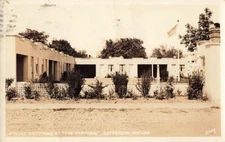 Postcard Jefferson, Oregon: Stucco Cottages at "The Terminal" | RPPC c.1930s