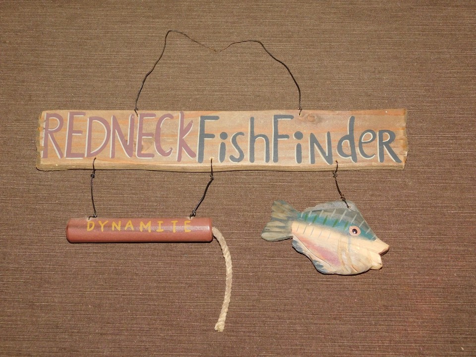 A genuinely vintage wood sign with hand-routed 'Redneck Fish Finder' dynamite gag — the kind of absurd cabin humor that predates irony.