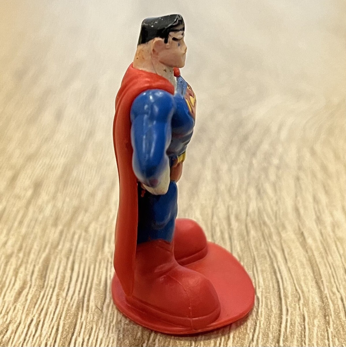 Vintage DC Comics Superman action figure miniature on stand