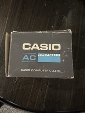 Genuine CASIO Calculator AC/DC Adapter Model AD-4150 Output 4.5V DC 600mA in Box
