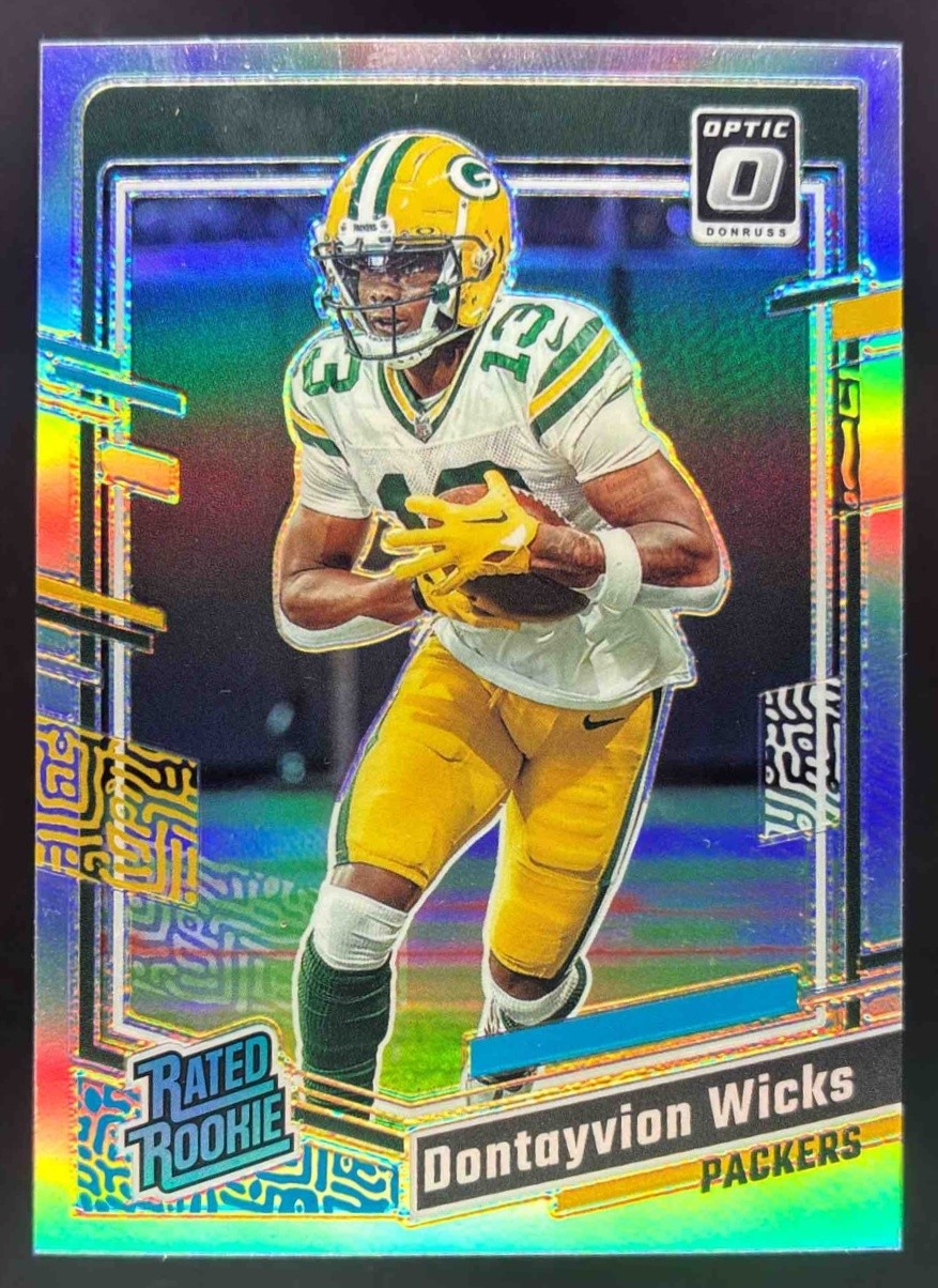 2023 Panini Donruss Optic Dontayvion Wicks Holo Prizm #249 RC Rated Packers
