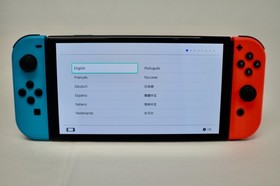 Nintendo Switch OLED Model HEG-001 Handheld Console - 64GB - Red & Blue