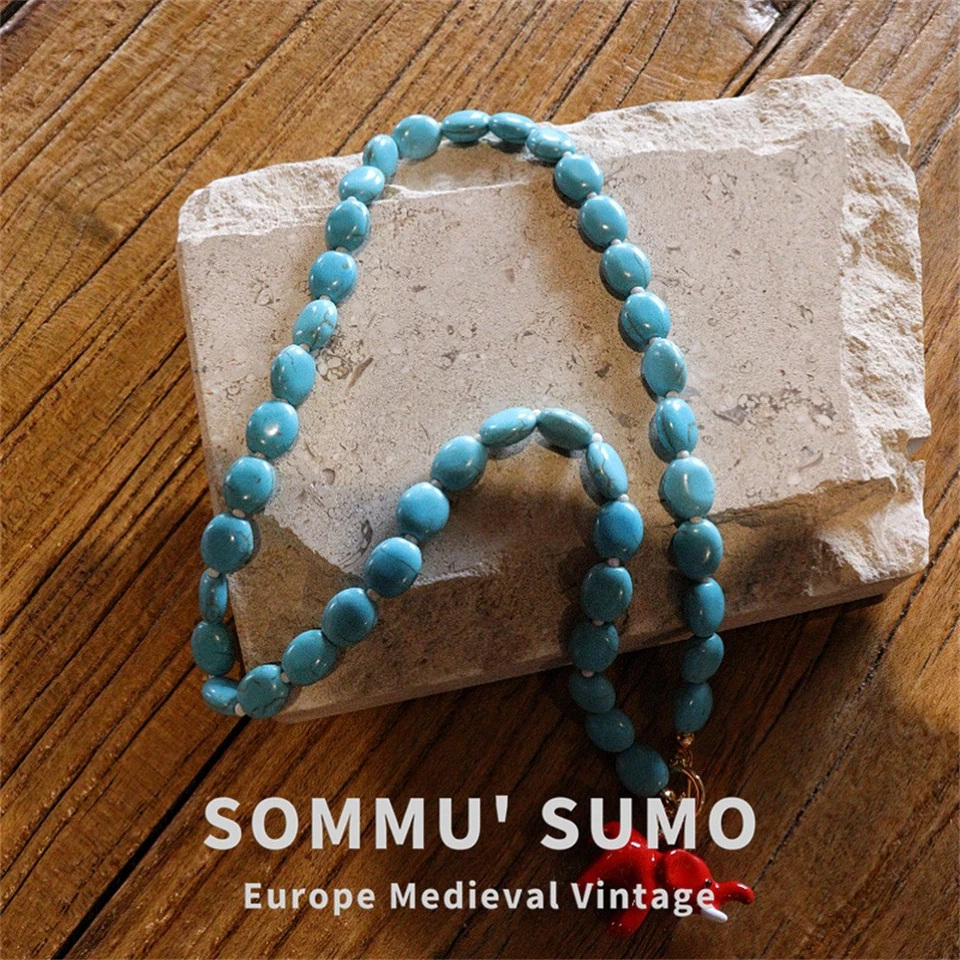 Collar Literario Chapado en Oro Pequeño Elefante Retro Piedra Turquesa Foto 2 de 4