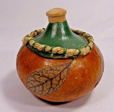 Gourd folk art signed "Rattlesnake Weed" painted skeletal leaves, wood knob