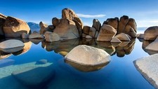 Landscape nature water sky blue calm waters clear rocks Custom Gaming Mat Desk