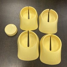  4 Medela bottle stand With Bottle Lid