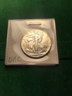 1944 D walking liberty unc.