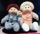 Cabbage-Vintage with Brown Hair/Eyes And Blonde Hair/Blue Eyes Both Signed 1985.