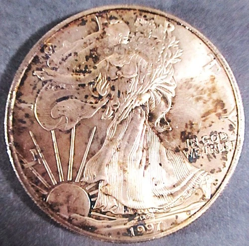 1997 WALKING LIBERTY/AMERICAN EAGLE SILVER DOLLAR, NEAR UNCIRCULATED W/SPOTTING