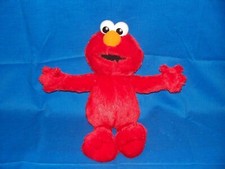 Sesame Street Elmo Loves You plush heart eyes light up sings hug Fisher Price