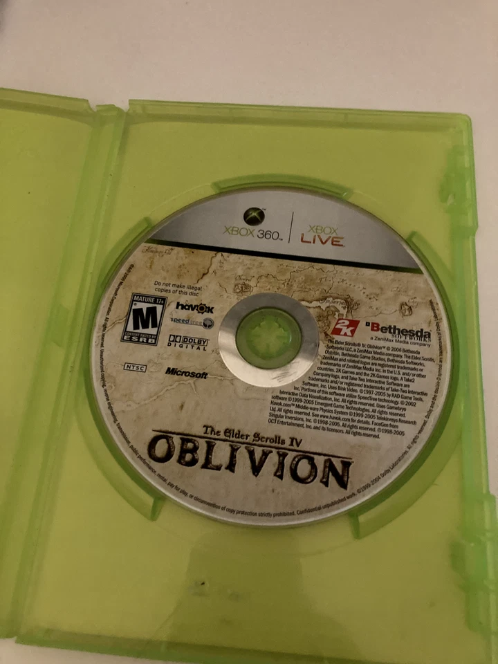 Cinco juegos surtidos de Xbox 360 - Oblivion, Mass Effect Trilogy, Arkham Asylum Foto 3 de 4