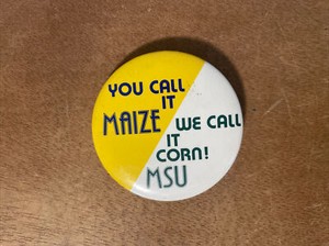 UM-MSU Rivalry You Call It Maize We Call It Corn Pinback Button 2”