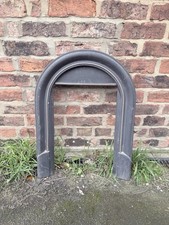 cast iron arched fireplace insert Liner simple raised border.  Fireback  Liner