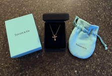 Tiffany  Co. 18K Yellow Gold Small Cross Curve Necklace Pendant Elsa Peretti