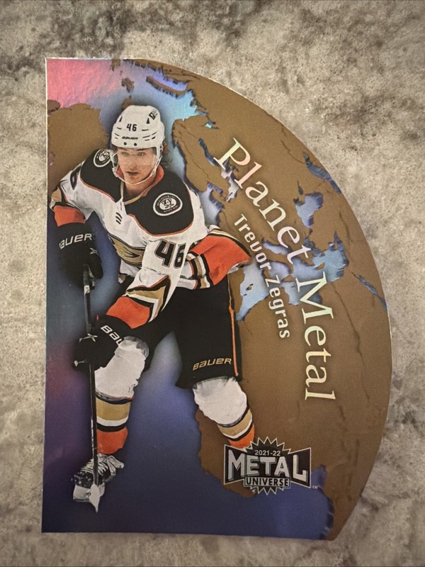 2021-22 SkyBox Metal Universe Trevor Zegras Planet Metal Gold #PM-13 Ducks