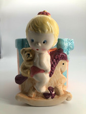 Nursery Planter. Baby on Rocking Horse with Teddy Bear.